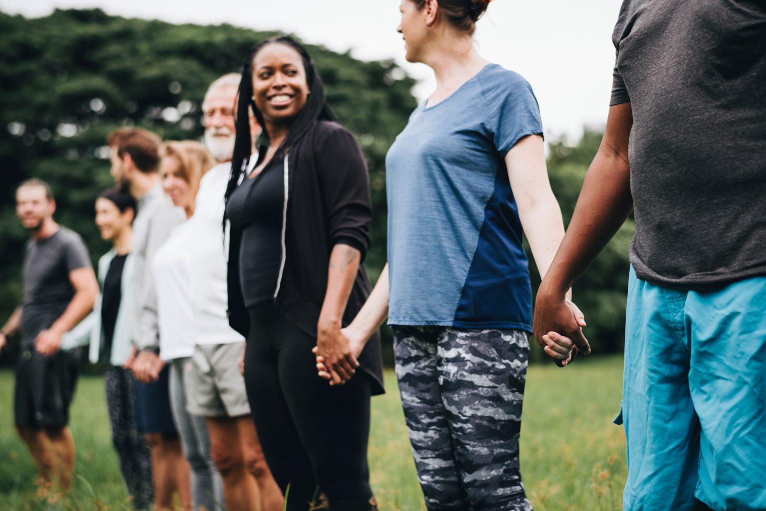 Happy diverse people enjoying in the park